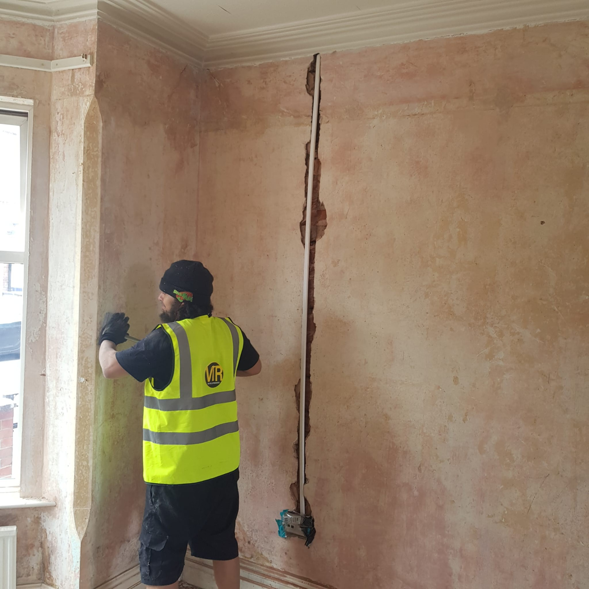 VTR tradesperson preparing walls for plastering