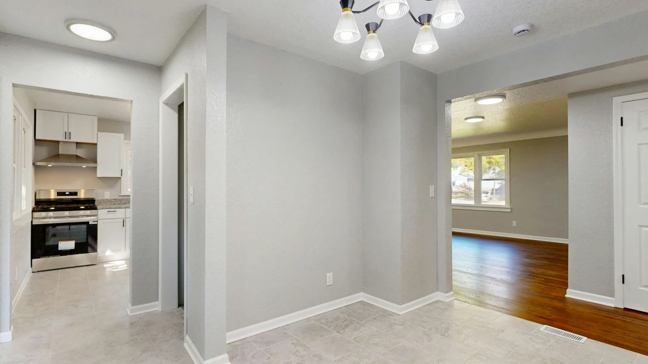Stock photograph of a clean, empty home interior with tiled and timber floors