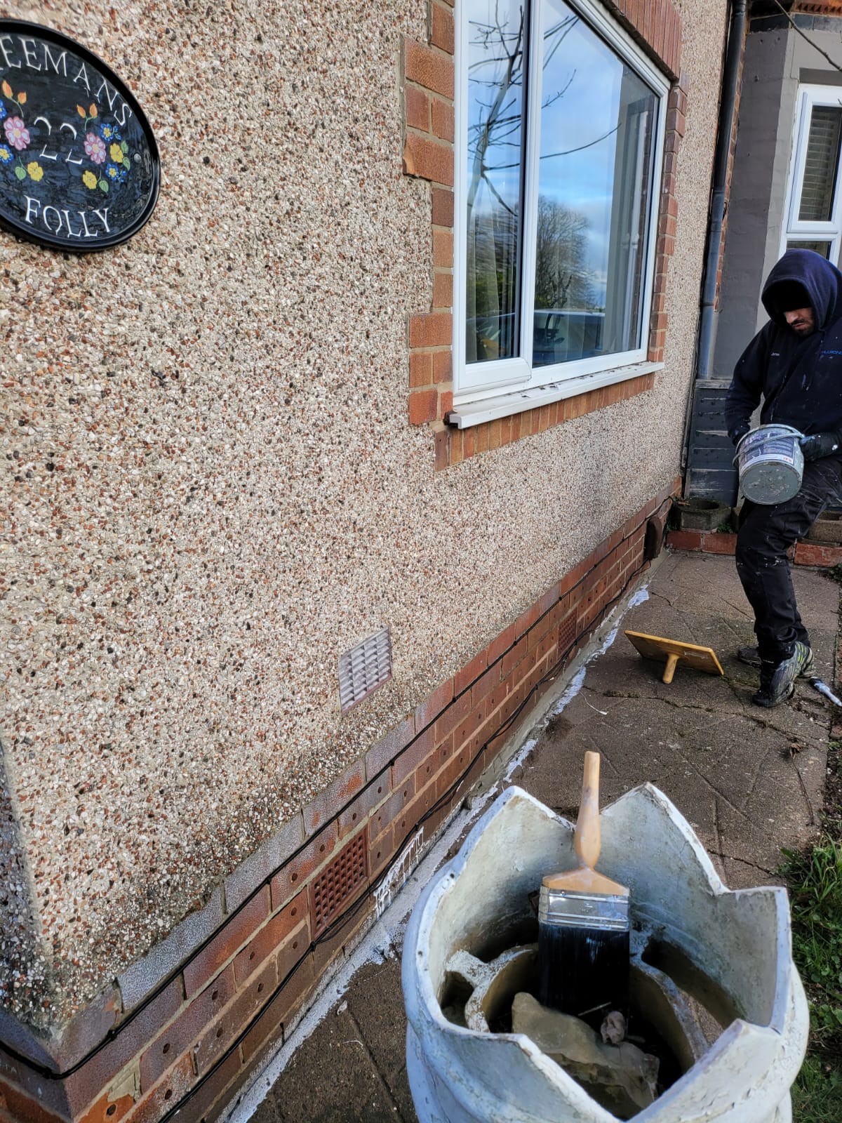 Damp-proofing photograph, during stage
